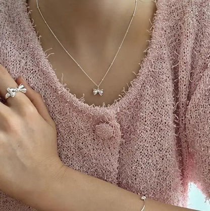 Sterling Silver Bow Pendant Necklace: Yellow Gold